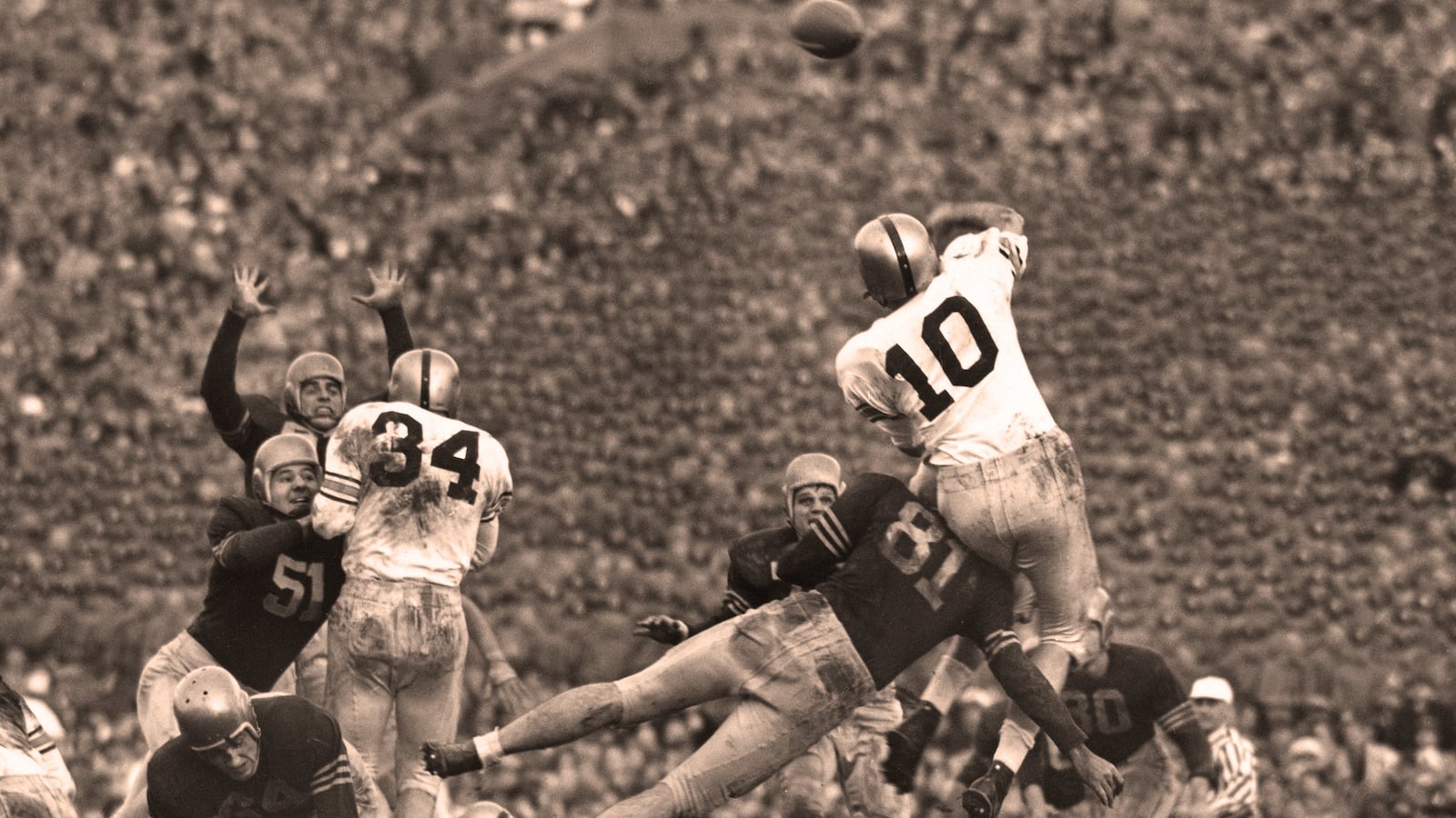 articles/2014/12/13/a-west-point-mvp-who-never-played-a-down/141212-mills-army-navy-tease_ktio4a