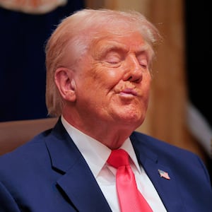 President Donald Trump attends a meeting of his Cabinet in the Cabinet Room of the White House on December 02, 2025 in Washington, DC.