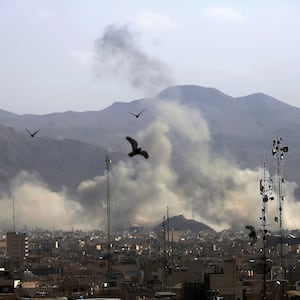TEHRAN, IRAN - FEBRUARY 28: Smoke rises over the city center after an Israeli army launches 2nd wave of airstrikes on Iran on February 28, 2026.