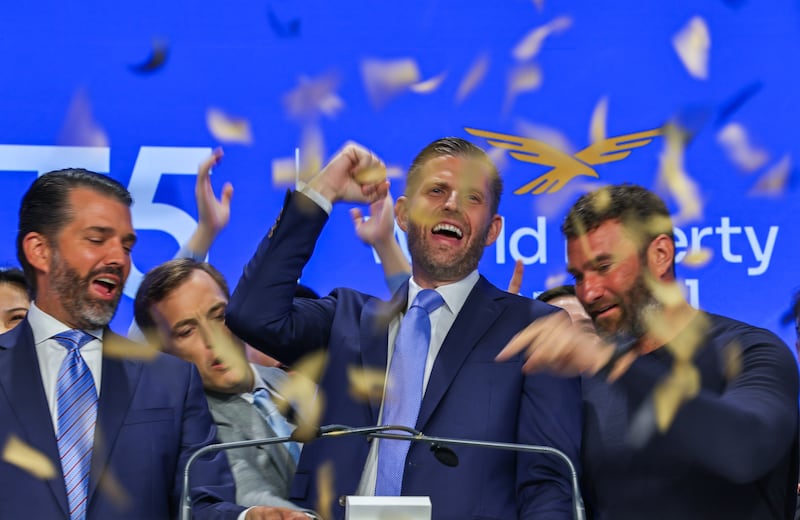 Eric Trump (center) after he was newly appointed ALT5 Board Director of World Liberty Financial.