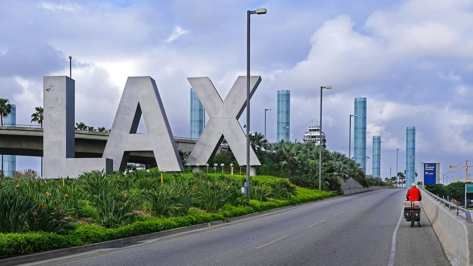 Touring cyclist arriving at LAX, Los Angeles International Airport at Westchester, California