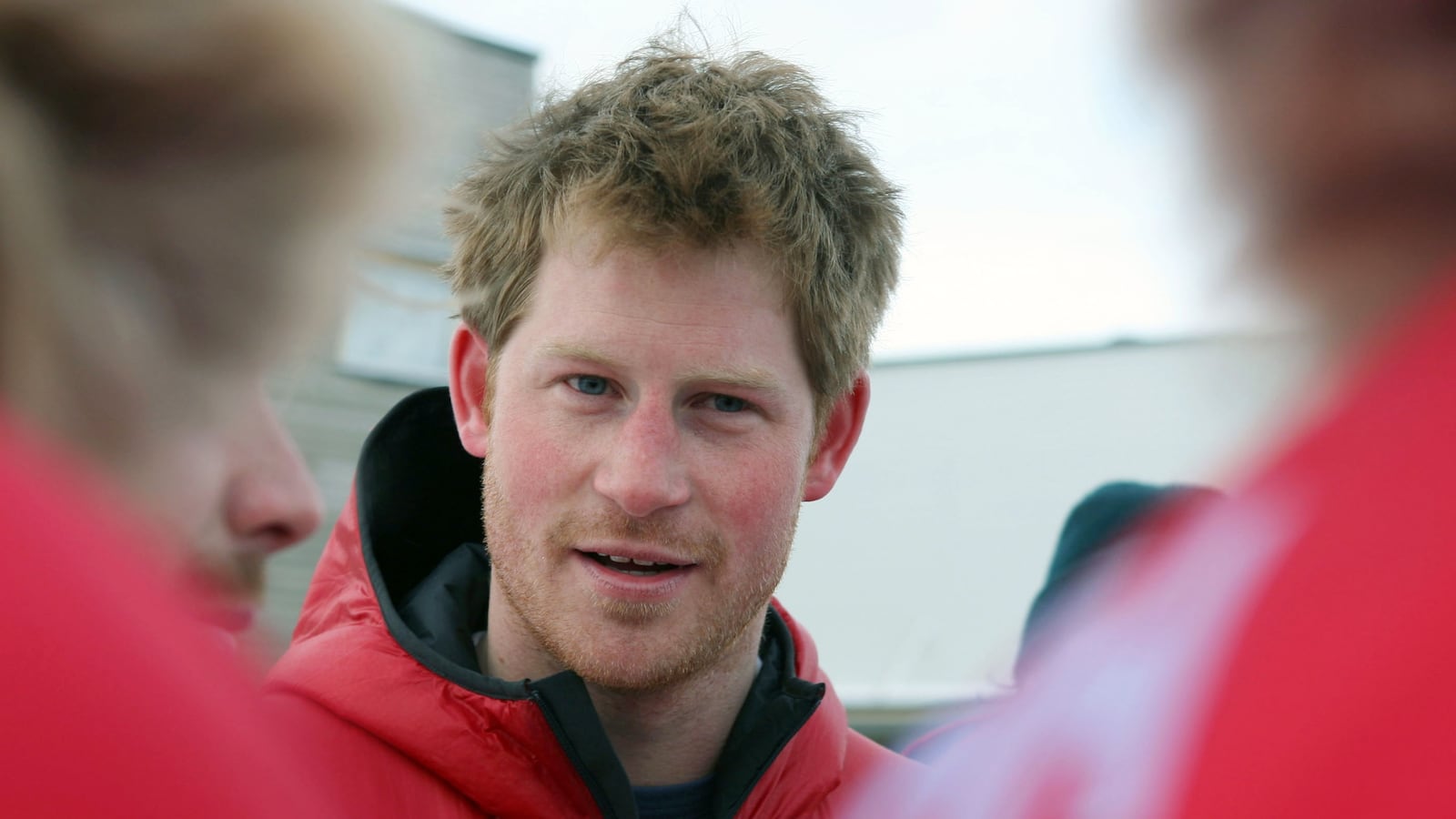 Britain's Prince Harry smiles before departing for the airport to load their kit before the flight to the Borneo ice field on April 2, 2011. Prince Harry joined The Walking with the Wounded teamgathered on the island of Spitssbergenon, situated between the Norwegian mainland and the North Pole for their last days of training before setting off to walk to the North Pole.
