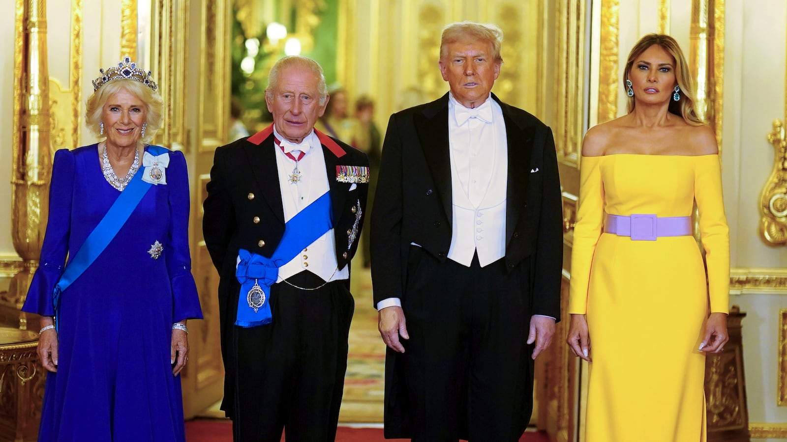 WINDSOR, ENGLAND - SEPTEMBER 17: U.S. President Donald Trump, (2nd R) First Lady Melania Trump, (R) King Charles III and Queen Camilla (L) arrive for the State Banquet hosted by King Charles III and members of the Royal Family at Windsor Castle during the state visit by the President of the United States of America on September 17, 2025 in Windsor, England. President Trump is in England from Sept. 16-18 on his second UK state visit, with the previous one taking place in 2019 during his first presidential term. (Photo by Aaron Chown-WPA Pool/Getty Images)