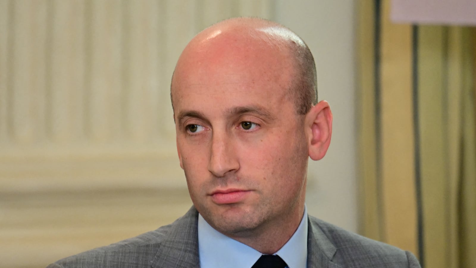 White House deputy chief of staff Stephen Miller looks on during a law enforcement roundtable in the State Dining Room of the White House