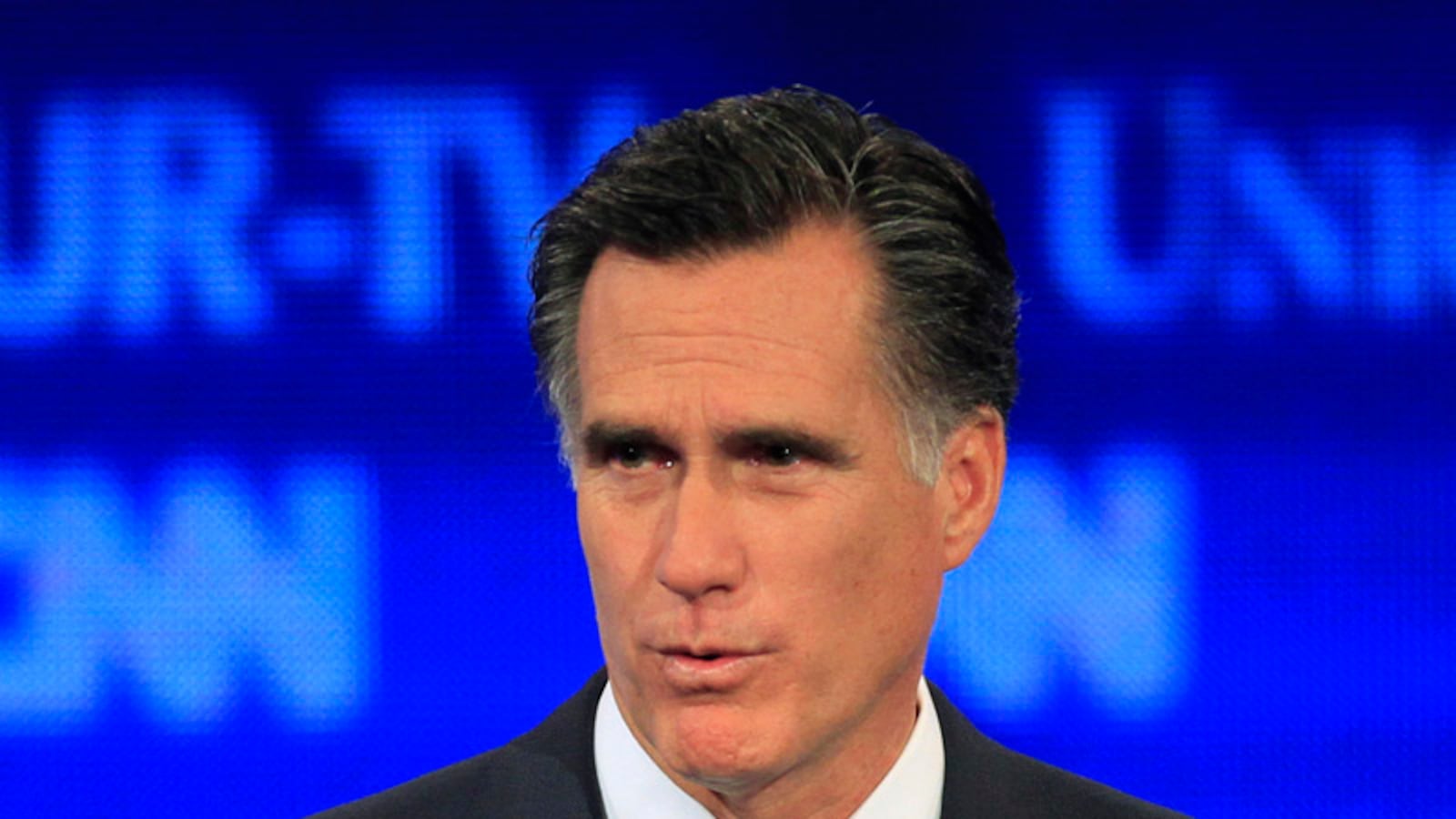 articles/2011/06/14/how-mitt-romney-michele-bachmann-won-new-hampshire-gop-debate/romney-debate-mckinnon_zqgb5t