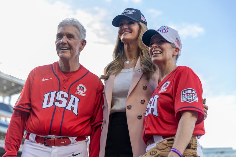 Republican Coach Congressman Roger Williams (R-TX) takes a photo with Small Business Administrator Kelly Loeffler and Senator Joni Ernst (R-IA) ahead of the Congressional Baseball Game at Nationals Park in Washington, DC, United States, on June 10, 2026.