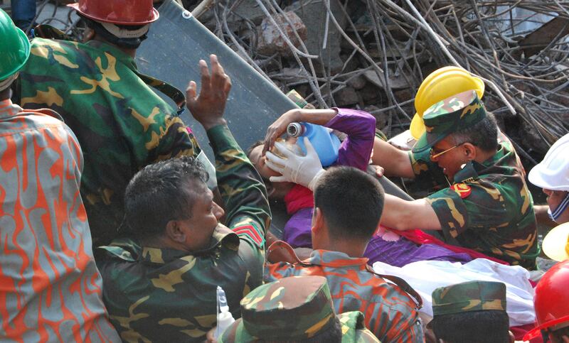 galleries/2013/05/10/woman-rescued-from-rubble-17-days-after-bangladesh-factory-collapse-photos/garment-rescue-5_uax7dm