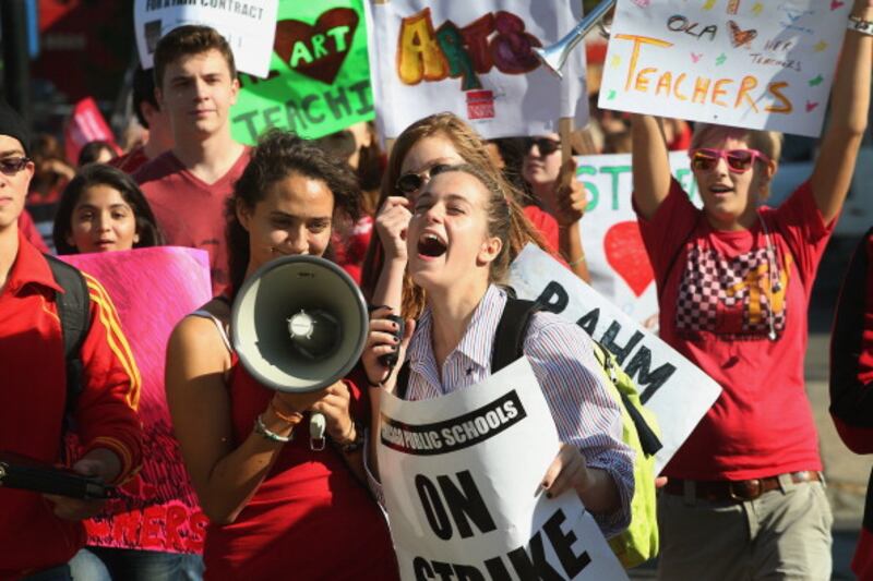 articles/2012/09/11/you-re-either-with-us-or-against-us/kid-striking_dkdkyo