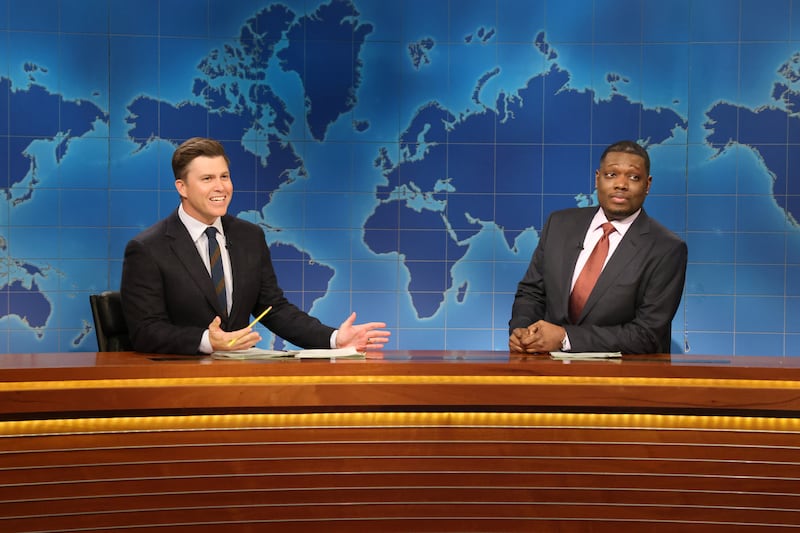 Anchor Colin Jost and anchor Michael Che