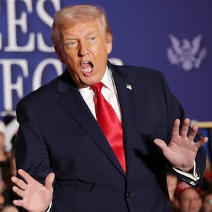 U.S. President Donald Trump enters to deliver remarks during an event at Mount Airy Casino Resort.