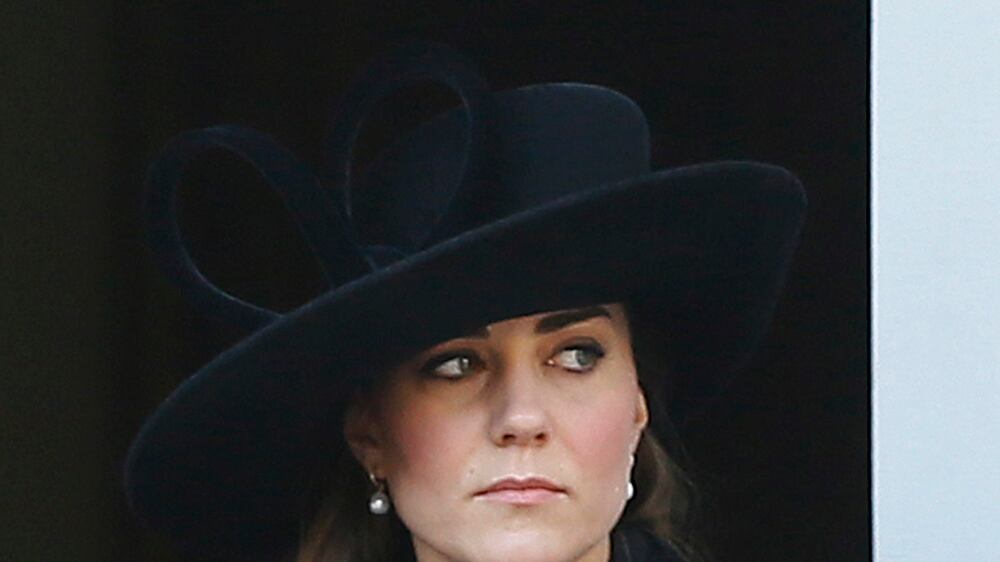 articles/2012/11/12/kate-middleton-recycles-a-diane-von-furstenberg-coat-kristen-stewart-explains-her-converse-sneakers/kate-middleton-remembrance-day-2012-cheat_obzkcj