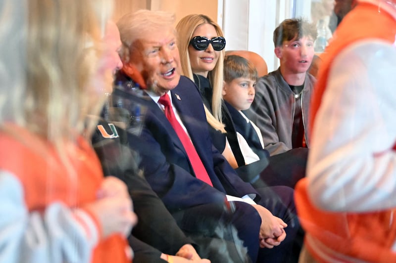 US President Donald Trump and his daughter Ivanka Trump attend the College Football National Championship Game between the Miami Hurricanes and the Indiana Hoosiers at Hard Rock Stadium in Miami Gardens, Florida, on January 19, 2026.