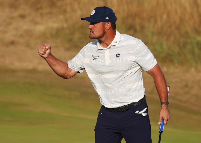 Golf - The 154th Open Championship - Royal Birkdale Golf Club, Southport, Britain - July 18, 2026 Bryson DeChambeau of the U.S. reacts after he holes for a birdie on the 17th hole during the third round REUTERS/Phil Noble