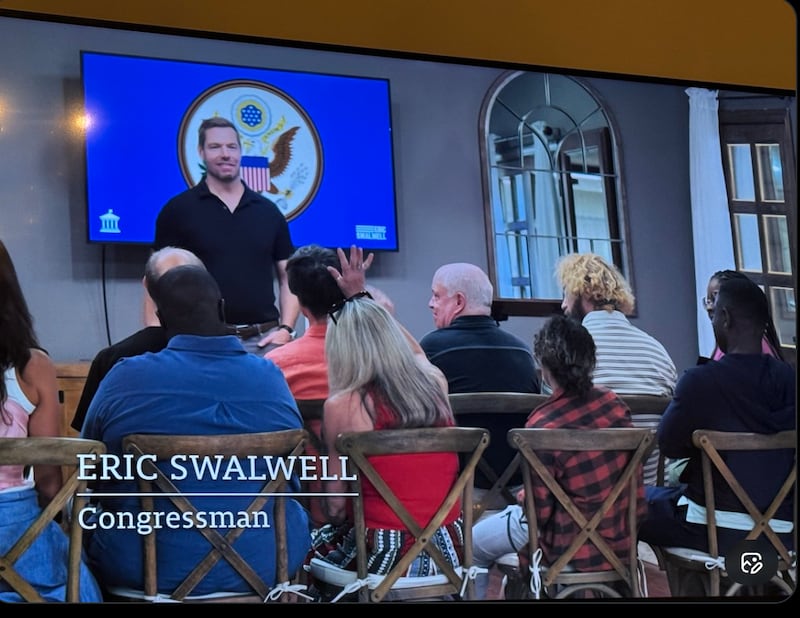 Eric Swalwell speaking to people