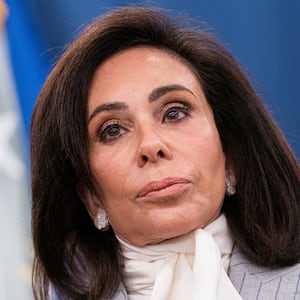 U.S. Attorney for the District of Columbia Jeanine Pirro looks on while announcing charges in connection with an international car theft ring during a press conference at the Justice Department in Washington, D.C., U.S., April 22, 2026.