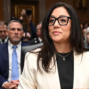 Lori Chavez-DeRemer arrives at a US Senate Health, Education, Labor, and Pensions hearing on her nomination to be Secretary of Labor. Her husband, Dr. Shawn Deremer sits behind her.