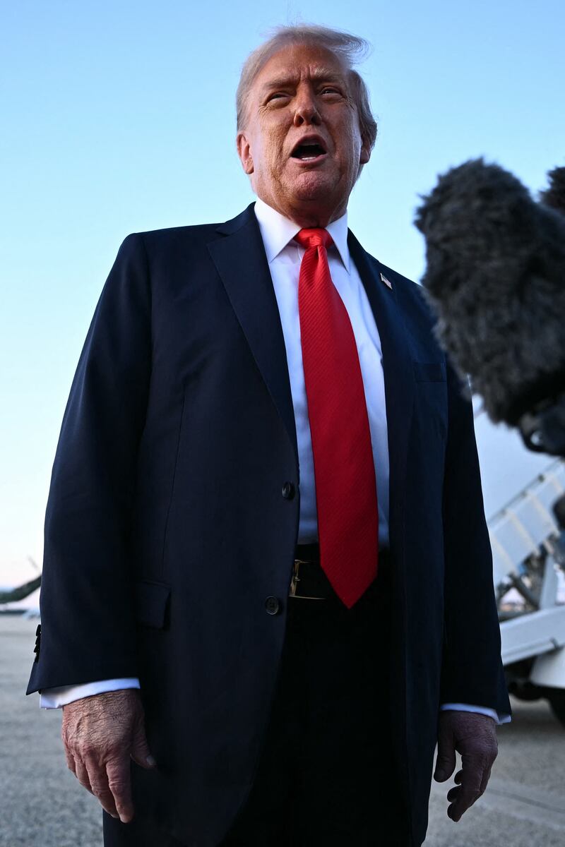 US President Donald Trump speaks to reporters after stepping off Air Force One upon returning to Joint Base Andrews in Maryland on September 7, 2025. Trump is returning from New York where he attended the US open men's final. (Photo by Mandel NGAN / AFP) (Photo by MANDEL NGAN/AFP via Getty Images)