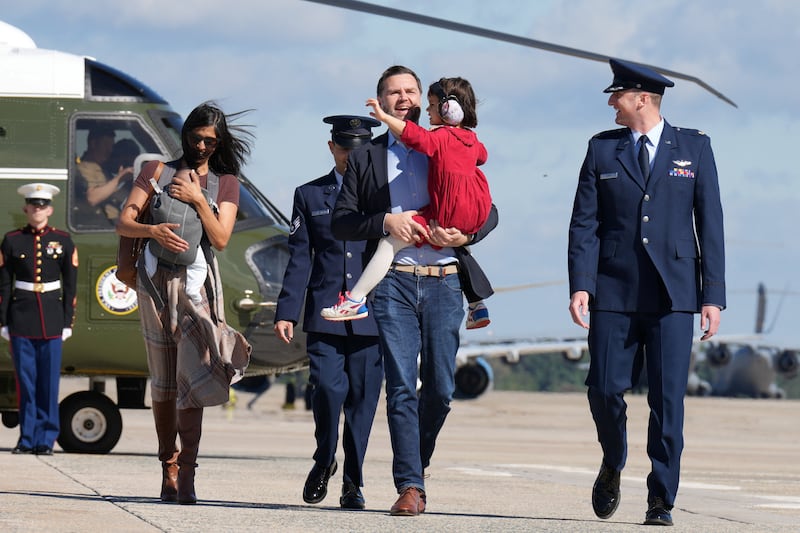 US Vice President JD Vance is escorted to board Air Force Two with his wife Usha and children Mirabel and Alec, on the day of his travel to Alaska, at Joint Base Andrews, Maryland, US, October 5, 2026. Jacquelyn Martin/Pool via REUTERS