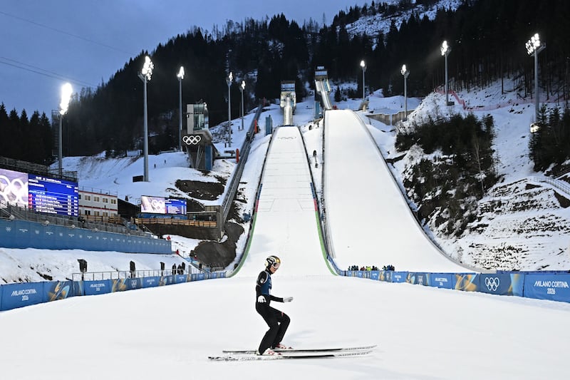 Italy's Martina Zanitzer arrives in the finish area after she jumped during the first round of the women's ski jumping normal hill training of the Milano Cortina 2026 Winter Olympic Games at Predazzo Ski Jumping Stadium in Predazzo (Val di Fiemme), on February 5, 2026. (Photo by JAVIER SORIANO / AFP via Getty Images)