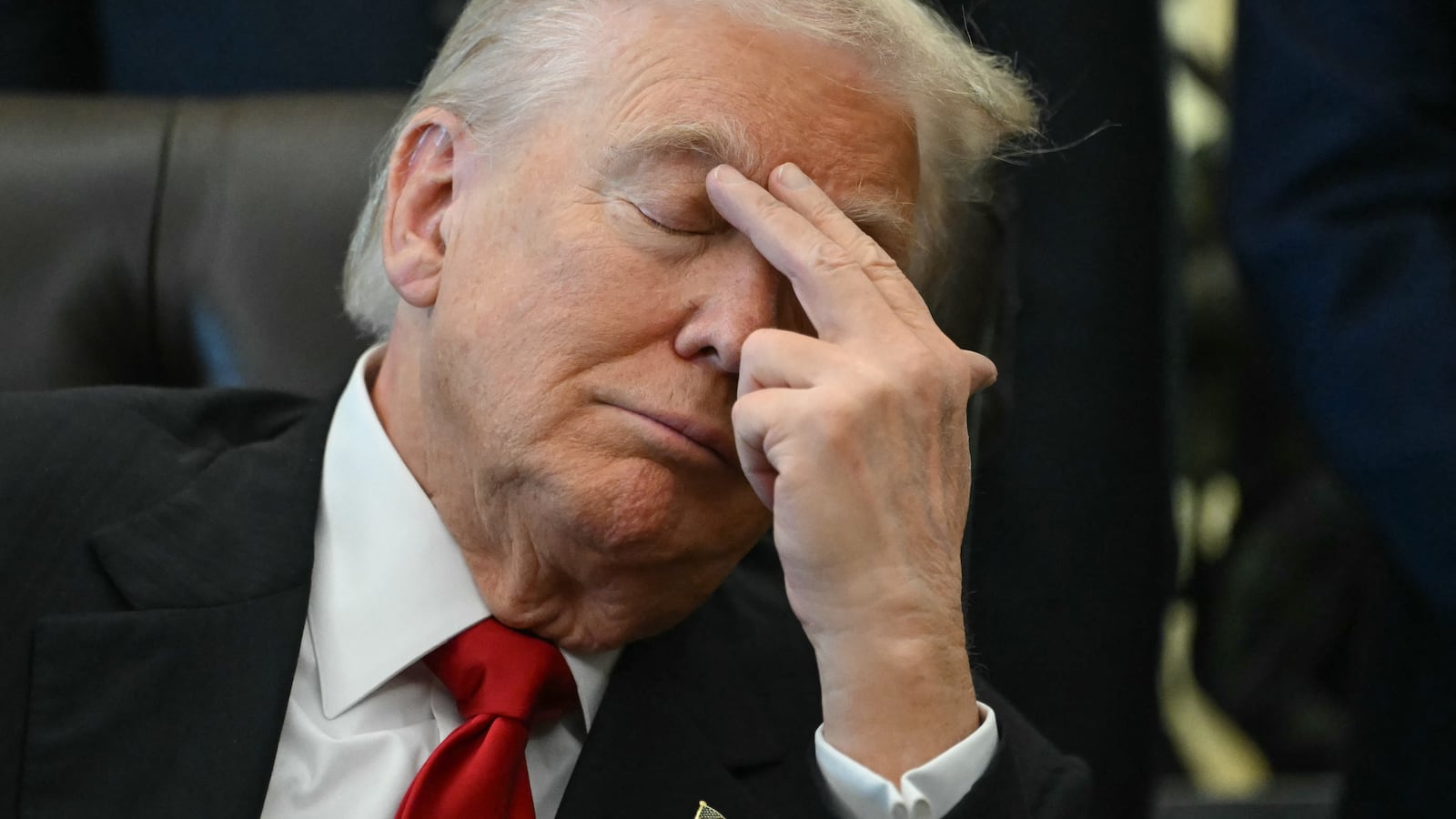 TOPSHOT - US President Donald Trump gestures as Secretary of Health and Human Services Robert F. Kennedy Jr. speaks during an event about weight-loss drugs in the Oval Office of the White House in Washington, DC on November 6, 2025. Trump announced deals Thursday with pharmaceutical giants Eli Lilly and Novo Nordisk to lower the prices of some popular weight-loss drugs. Both companies "have agreed to offer their most popular GLP-1 weight-loss drug," Trump said, "at drastic discounts." (Photo by ANDREW CABALLERO-REYNOLDS / AFP) (Photo by ANDREW CABALLERO-REYNOLDS/AFP via Getty Images)