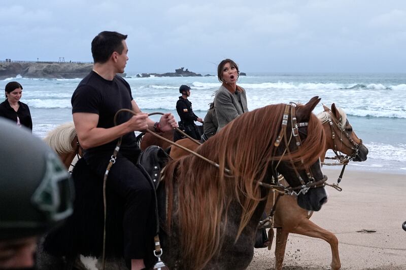 Homeland Security Secretary Kristi Noem and Ecuador President Daniel Noboa ride horses at Ulpiano Paez Air Base on November 5, 2025 in Manta, Ecuador.