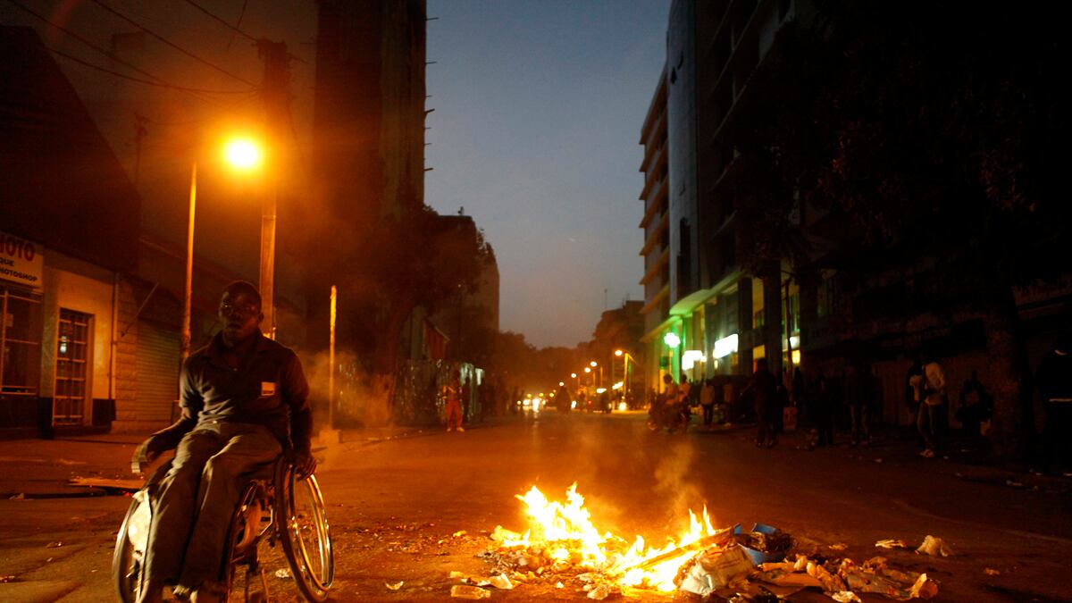 articles/2012/02/25/senegal-presidential-elections-violence-flares-over-wade-s-candidacy/senegal-election-violence-henderson_jgnbfr