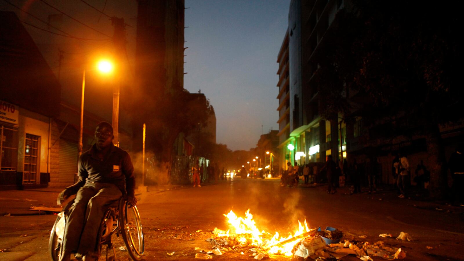 articles/2012/02/25/senegal-presidential-elections-violence-flares-over-wade-s-candidacy/senegal-election-violence-henderson_jgnbfr