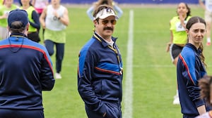 Brendan Hunt, Jason Sudeikis and Tanya Reynolds in Ted Lasso.