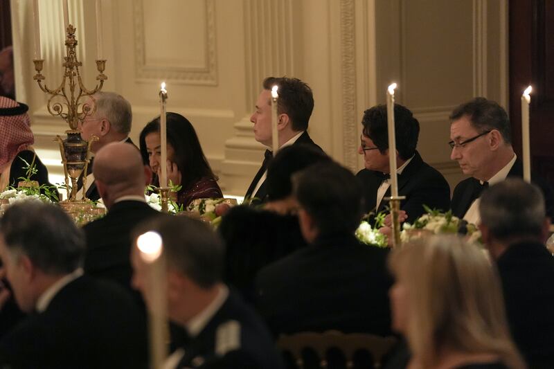 Elon Musk attends a dinner hosted by President Donald Trump for Saudi Crown Prince Mohammed bin Salman on Tuesday, Nov. 18, 2025 at the White House in Washington, D.C.