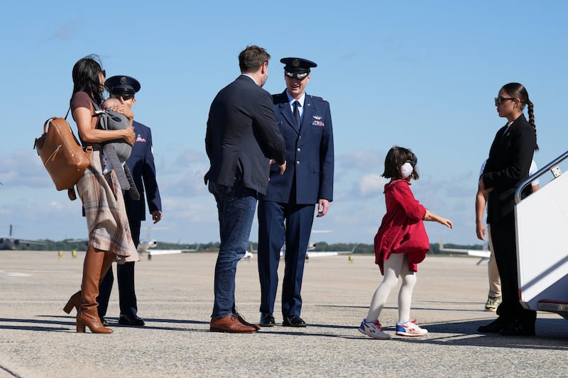 US Vice President JD Vance is escorted to board Air Force Two with his wife Usha and children Mirabel and Alec, on the day of his travel to Alaska, at Joint Base Andrews, Maryland, US, October 5, 2026. Jacquelyn Martin/Pool via REUTERS
