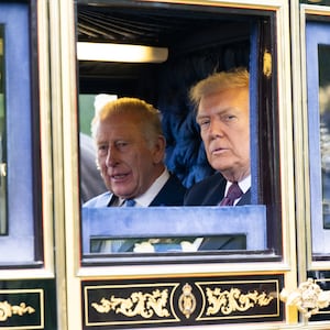 King Charles III and U.S. President Donald Trump in a carriage during the carriage procession during the State visit by the President of the United States of America at Windsor Castle on September 17, 2025 in Windsor, England.