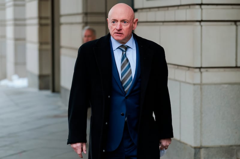 Sen. Mark Kelly, pictured leaving court on February 3, after he sued Defense Secretary Pete Hegseth and asked the federal court to vacate the Pentagon chief's letter censuring him and trying to demote him.