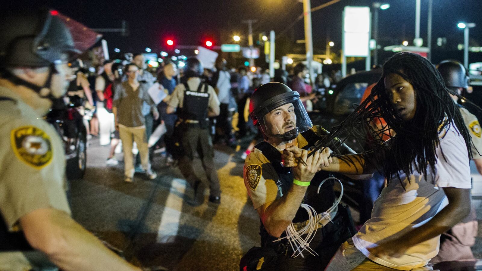 cheats/2016/05/16/journalists-arrested-in-ferguson-settle-with-st-louis-county/160516-ferguson-protests-cheat_dyk1mb