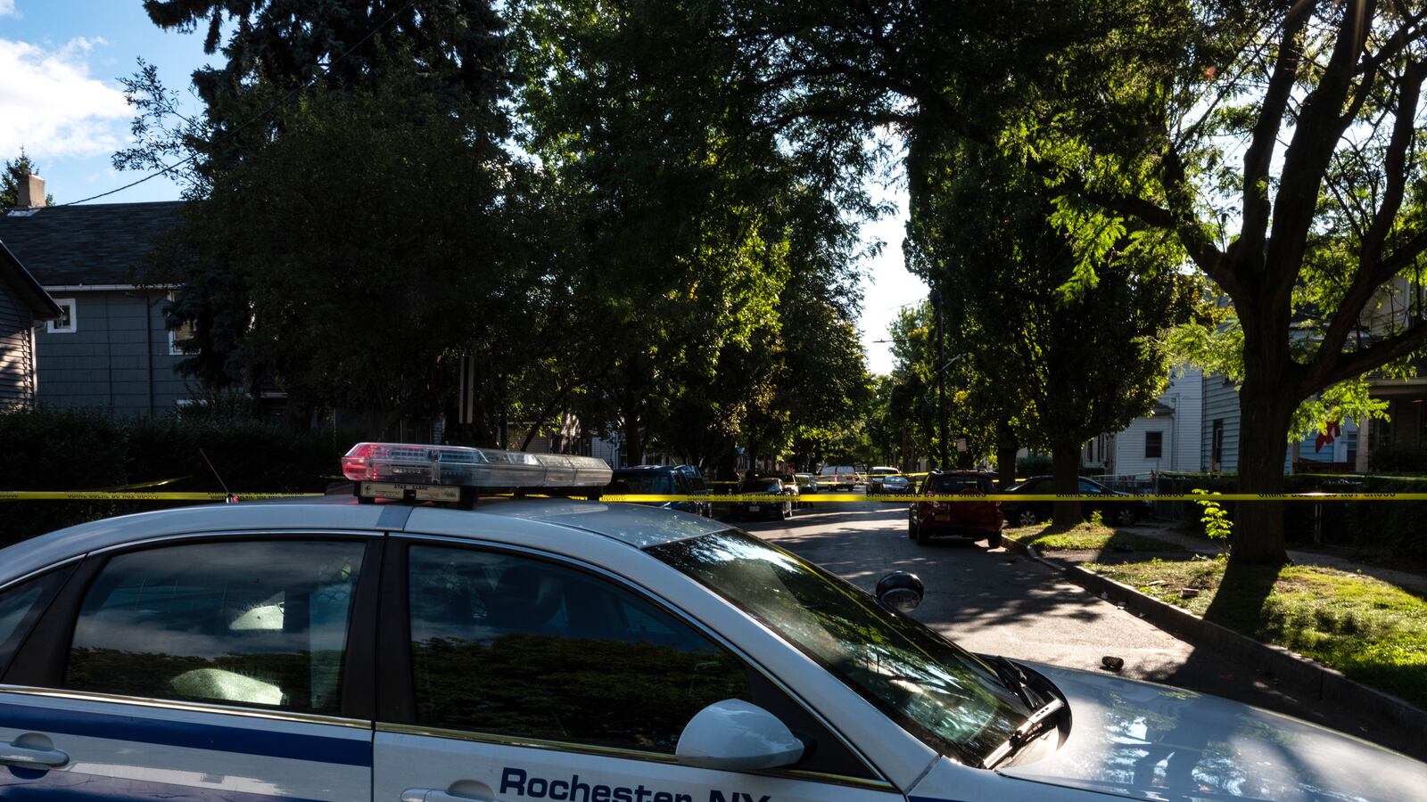 Police tape lines a crime scene after a shooting at a backyard party on September 19, 2020, Rochester, New York.