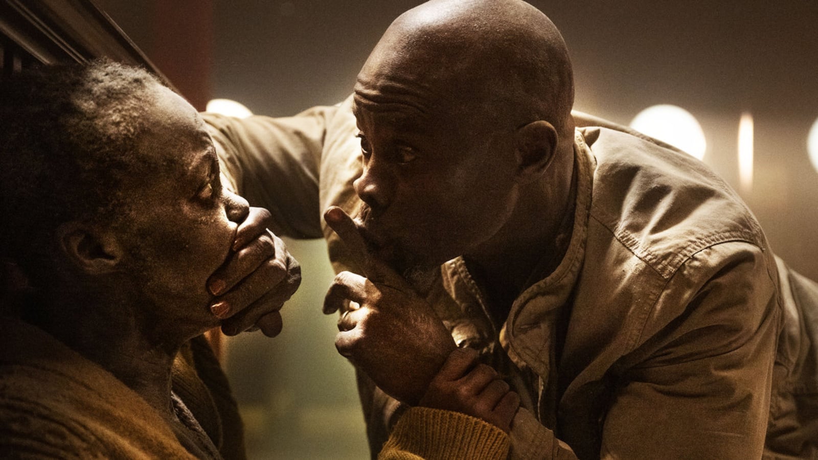 A photo including Lupita Nyong’o and Djimon Hounsou in the film A Quiet Place: Day One