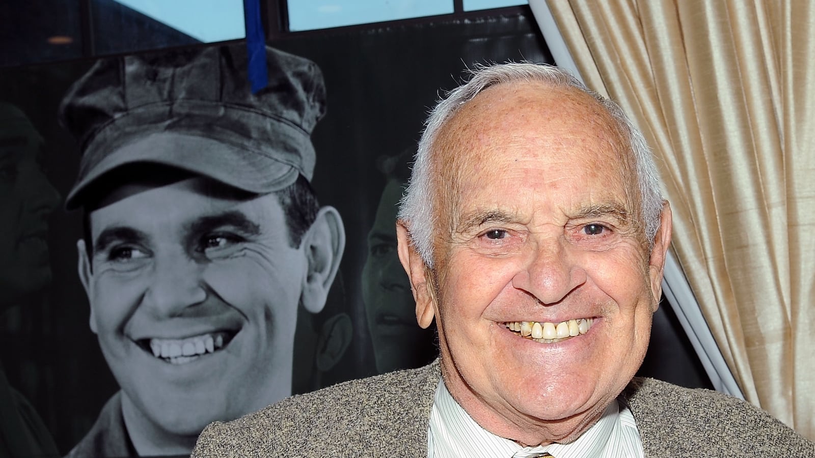Ronnie Schell poses next to the character he played on "Gomer Pyle"—Private Duke Slater.