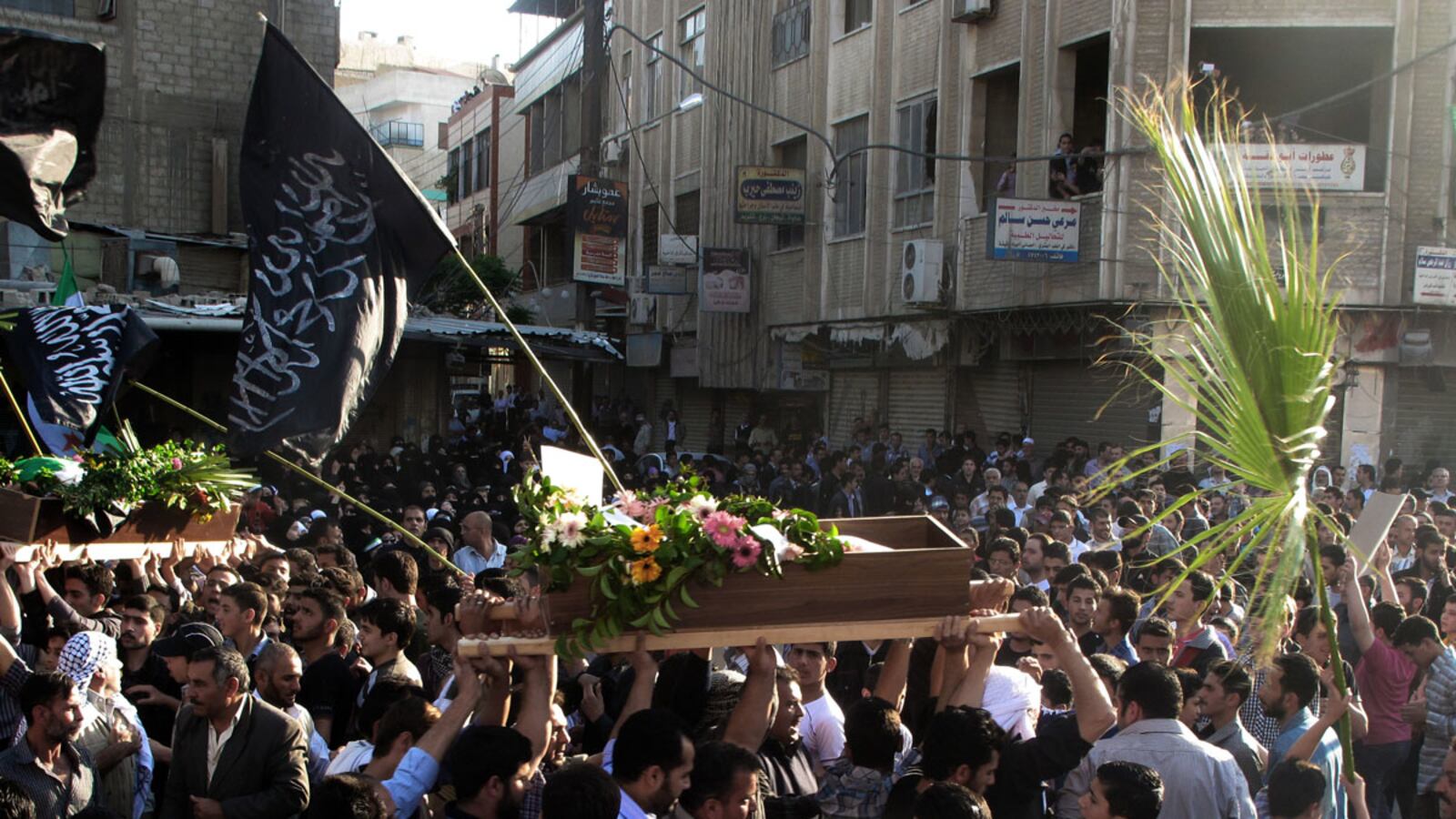cheats/2012/04/22/syrian-troops-strike-near-damascus/syria-funeral-douma-cheat_mwjr6k