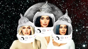 Kim Kardashian, Khloe Kardashian, Kourtney Kardashian wearing astronaut helmets with tinfoil hats on top in front of the Moon