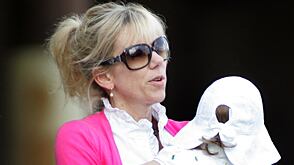 cheats/2010/02/10/enquirer-edwards-proposed-to-rielle/rielle-hunter-1_uyizsz