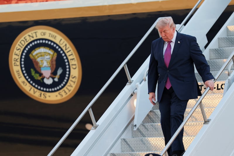 Donald Trump deboards the new Air Force One, a plane gifted by Qatar, in South Dakota, U.S., July 3, 2026.