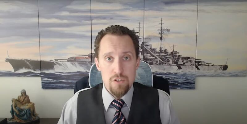E.J. Antoni, Trump's nominee to lead the Bureau of Labor Statistics, giving an interview in front of artwork of what appears to be the Nazi battleship the Bismarck. It is one of multiple interviews he has given in front of the artwork.