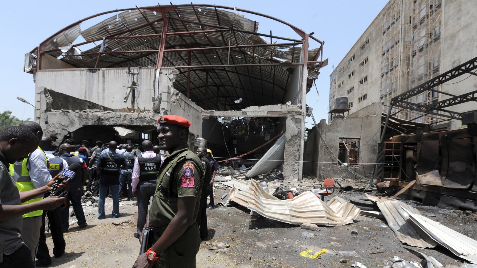 cheats/2012/04/26/bombs-rock-nigerian-newspaper/nigeria-newspaper-bomber-suicide-cheat_thqbzv