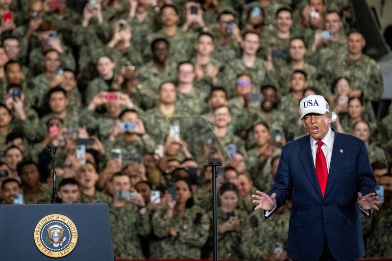 US President Donald Trump arrives to deliver a speech in front of US Navy personnel on board the US Navy's USS George Washington aircraft carrier at the US naval base in Yokosuka on October 28, 2025.