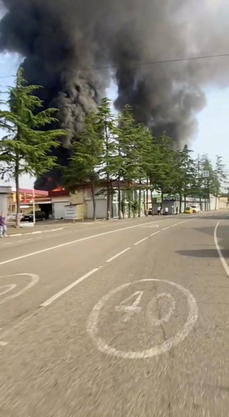 Smoke rises from an oil depot after a reported Ukrainian drone strike, in Krasnodar Krai, Russia, September 4, 2026, in this screengrab obtained a from social media video. Social Media/via REUTERS  THIS IMAGE HAS BEEN SUPPLIED BY A THIRD PARTY. NO RESALES. NO ARCHIVES. NEWS USE ONLY.   Verification Lines :  Reuters verified the location from buildings, trees, road signs and road layout which matched archive and satellite imagery.  Location of fire: 43.43425955252491, 39.93569264949287. The date was confirmed by local authorities in the Krasnodar region saying on Telegram that a Ukrainian drone strike caused a fire at an oil depot. NASA Firms also detected thermal activity at the location on September 4.  No older versions of the video found posted online before September 4.