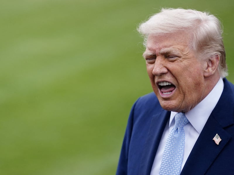 President Donald Trump speaks to the media as he departs the White House for Florida, in Washington, D.C., U.S., March 20, 2026.