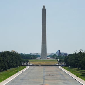 People look towards the drained Lincoln Memorial Reflecting Pool, following renovations and Independence Day celebrations, in Washington, D.C., U.S., July 15, 2026.