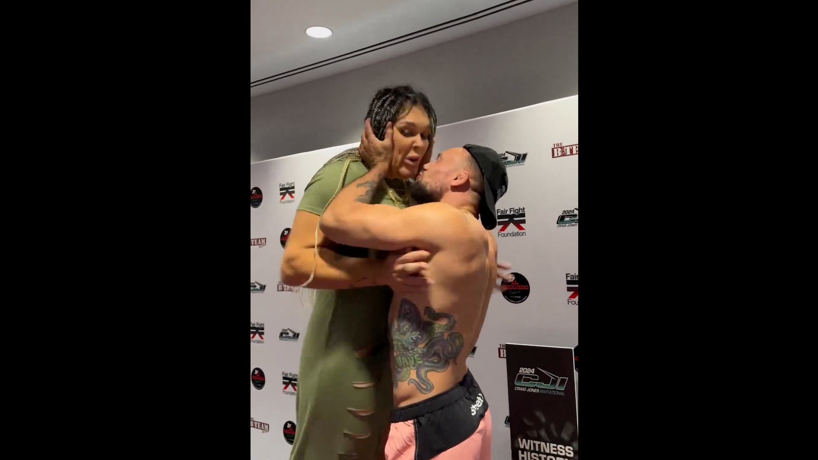 MMA fighter Gabi Garcia kissed by fighter Craig Jones