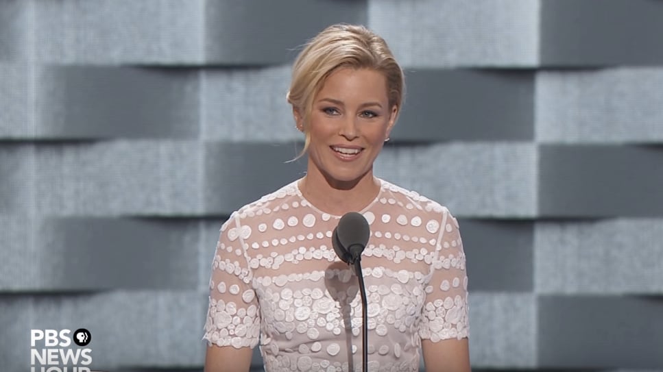 articles/2016/07/26/elizabeth-banks-trolls-trump-at-dnc-a-cruel-out-of-touch-reality-tv-star-who-wears-insane-wigs/160726-wilstein-elizabeth-banks-tease_jwjjuu