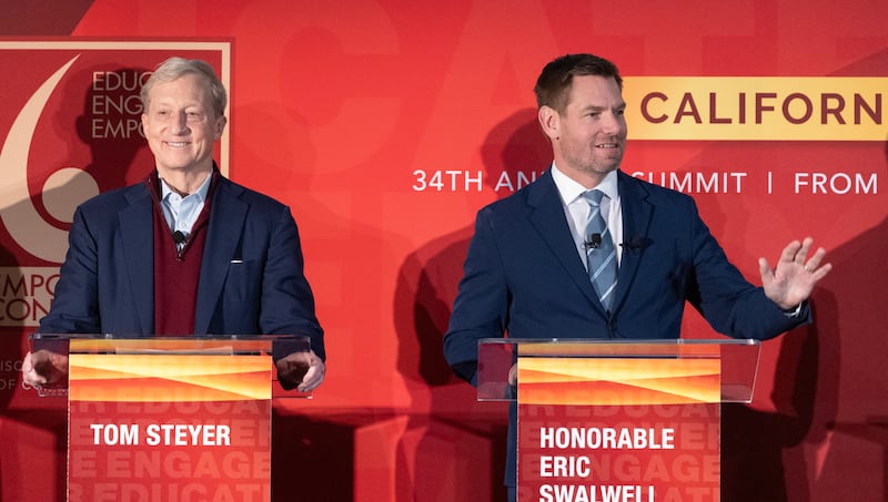 Gubernatorial candidates Tom Steyer, left, and Congressmember Eric Swalwell during the California Governor Candidate Forum presented by Empowerment Congress at the California Science Center in Los Angeles, CA on Saturday, Jan. 17, 2026.