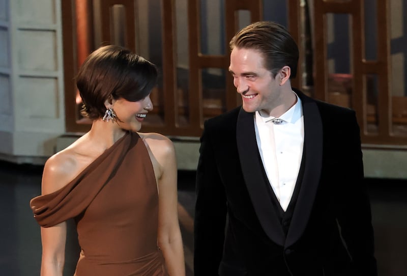 Zendaya and Robert Pattinson speak onstage during the 98th Oscars at Dolby Theatre on March 15, 2026, in Hollywood, California.